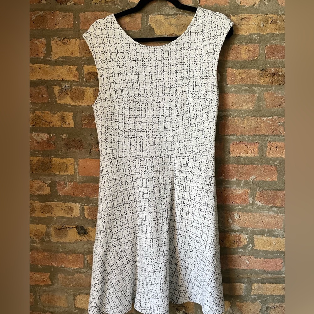 LOFT high neck, black and white pattered dress with peplum at bottom